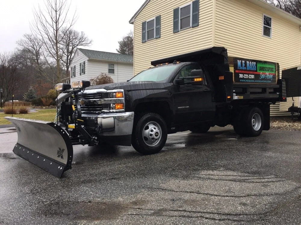 Professional lawn mowing service for outdoor upgrades in Burlington, MA by M.E. BASS LANDSCAPING