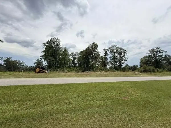 Affordable yard maintenance near you across Grand Bay, AL - Meadows Mulching Solutions