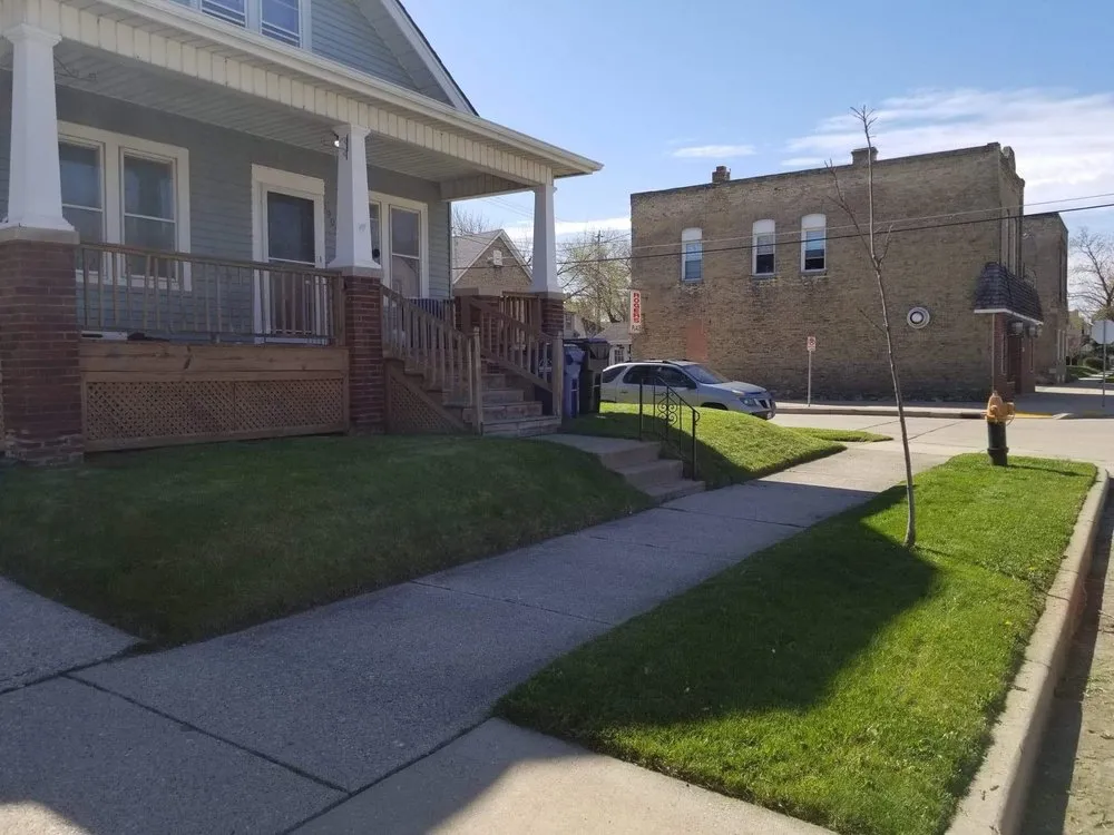 Professional yard cleanup service for residential properties across Racine, WI - Mean Green Cuts