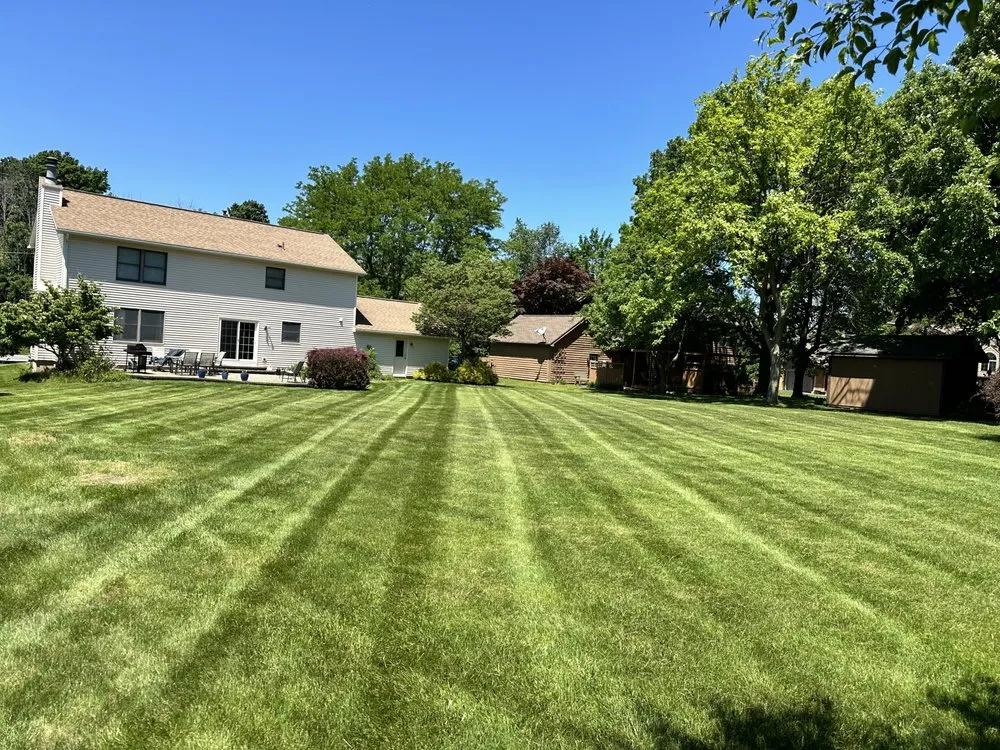 Reliable landscape design for homes in Rochester, NY by Mean Green Lawn Care