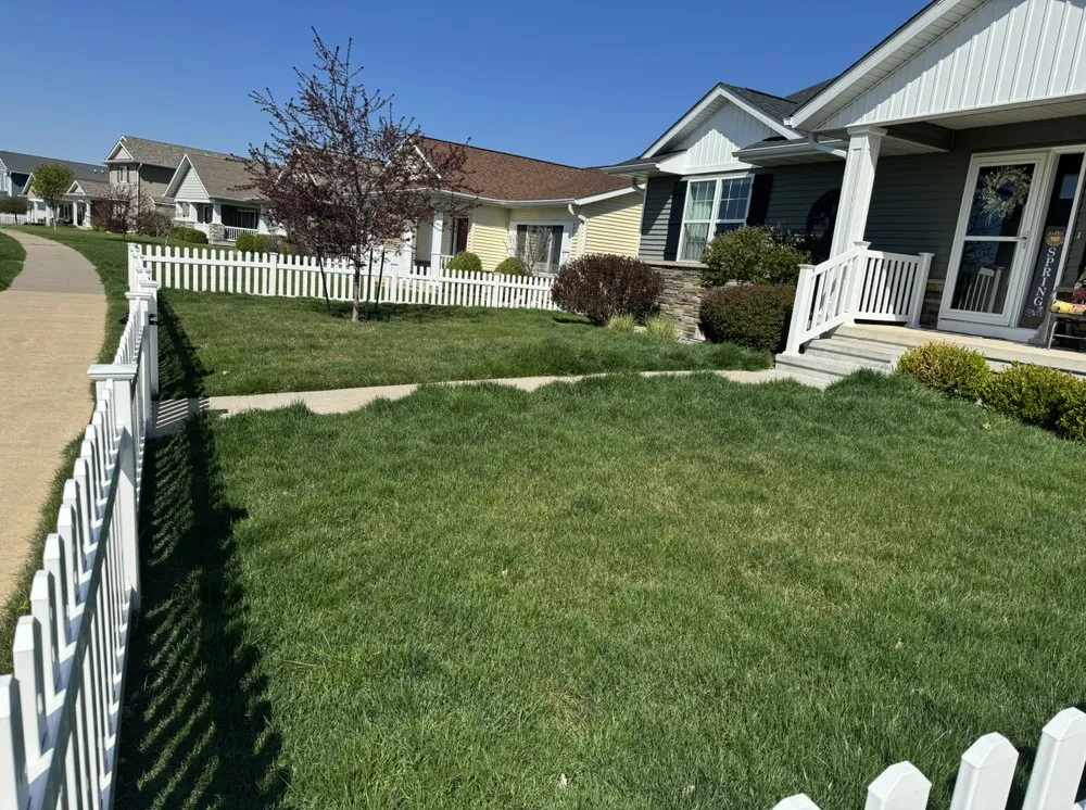 Custom garden landscaping for homes in Davenport, IA by Mean Green Lawncare