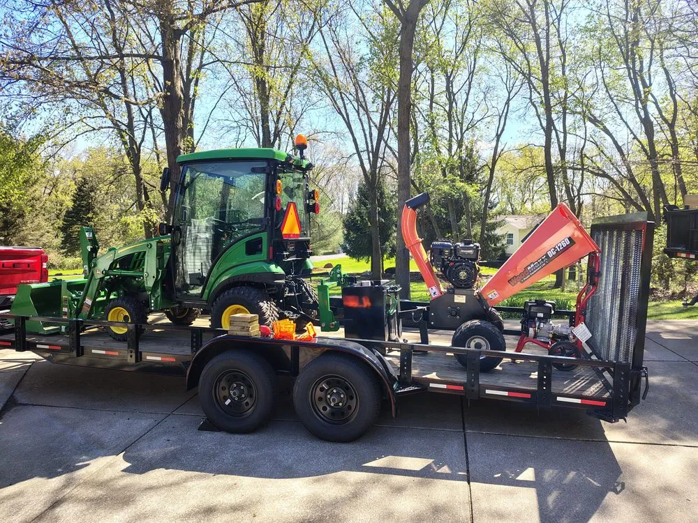 Professional garden landscaping with custom design across Ortonville, MI - Mean Green Tractor