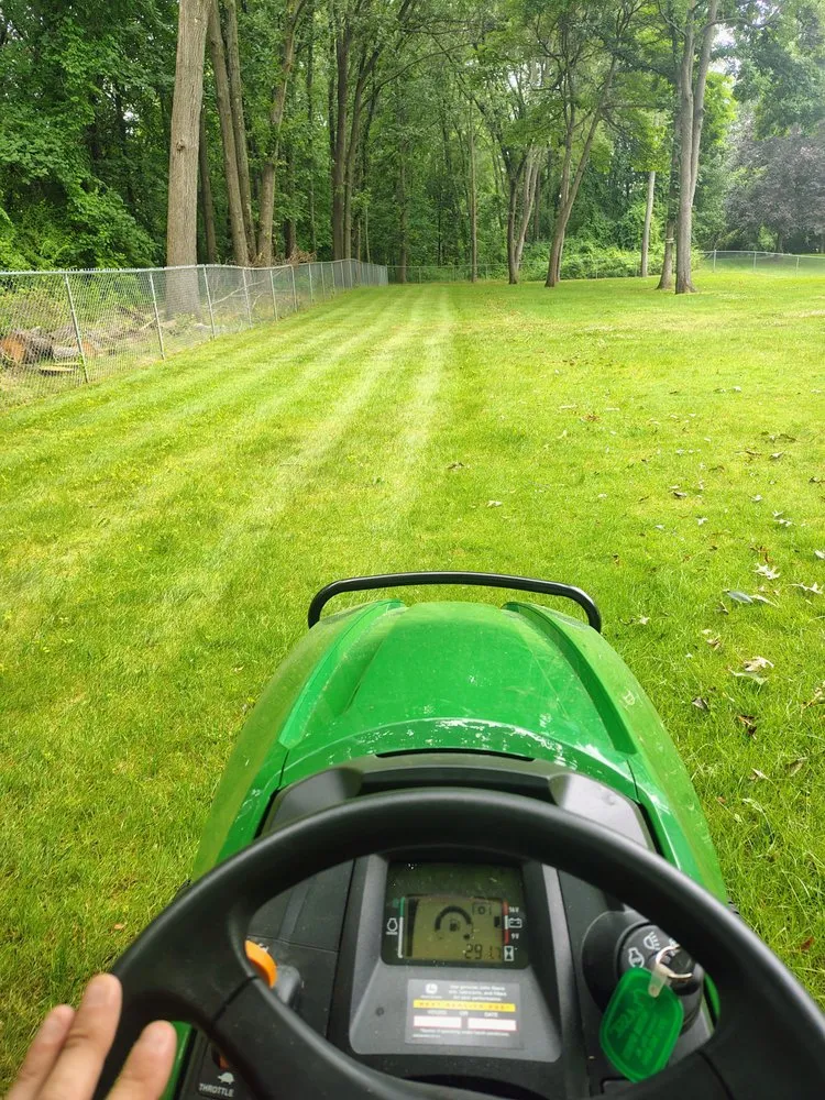 Expert lawn mowing service near you in Ortonville, MI by Mean Green Tractor