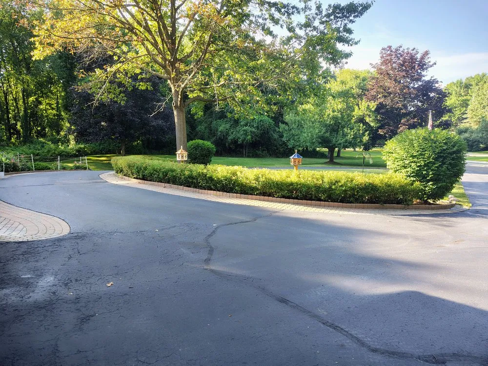 Custom lawn care service for year-round maintenance in Ortonville, MI by Mean Green Tractor