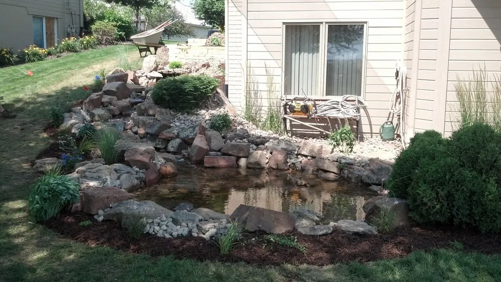 Trusted lawn mowing service for year-round maintenance in Omaha, NE by Mechaley Landscpaing