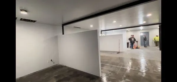 MEDINA IMPROVES Logo