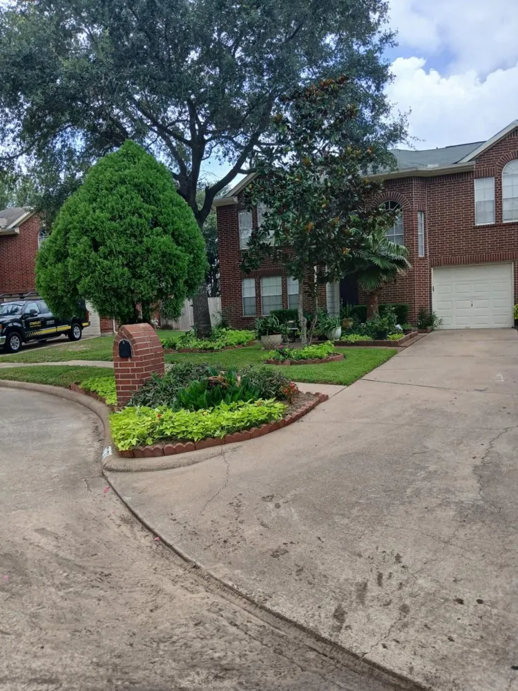 Professional lawn mowing service with custom design in Houston, TX by Medina Lawn & Landscape services