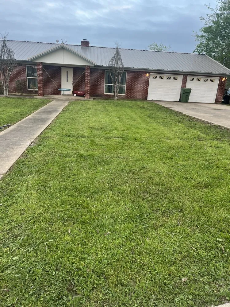 Top-rated lawn mowing service with custom design in Huntsville, TX by Mejia Landscaping and Lawn Service