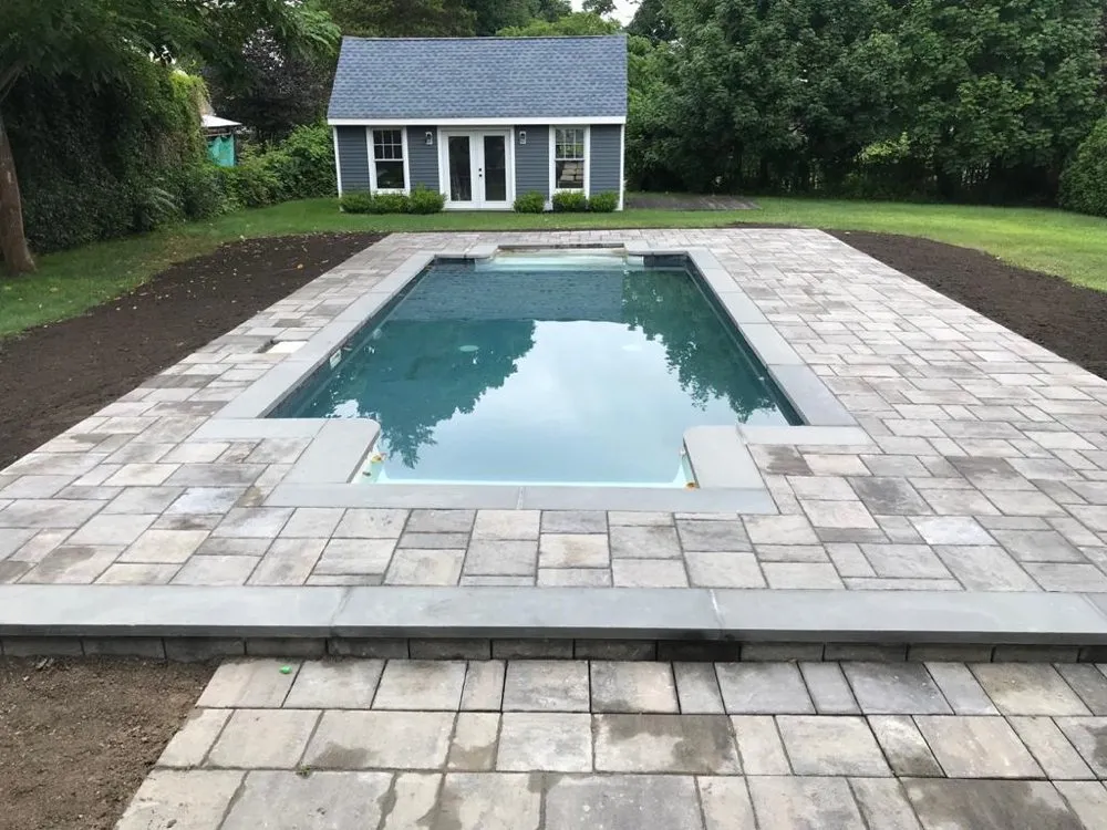 Professional landscape installation in Central Falls, RI by Melgar Masonry & Landscaping