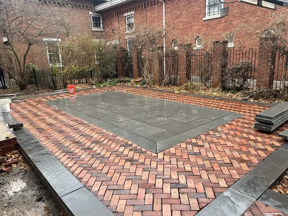 Affordable yard cleanup service in Central Falls, RI by Melgar Masonry & Landscaping