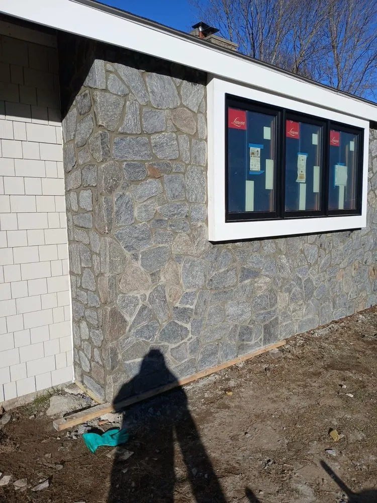 Professional lawn mowing service for beautiful yards in Central Falls, RI by Melgar Masonry & Landscaping