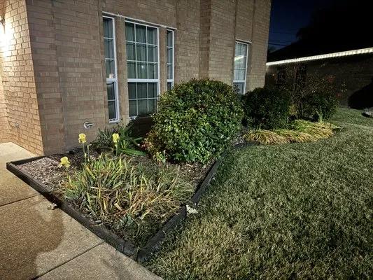 Mel's Lawn Care Service Logo