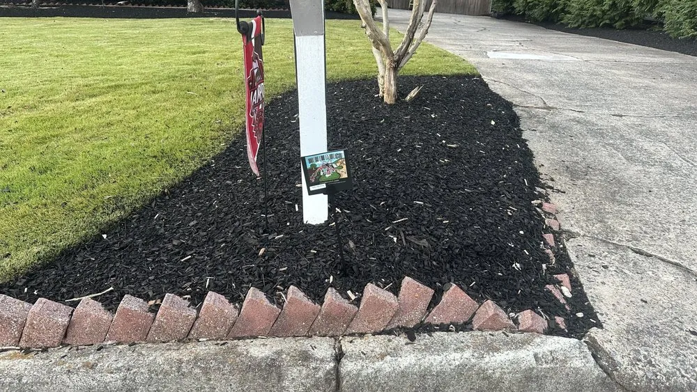 Professional landscape installation with custom design in Marietta, GA by Men In Mulch