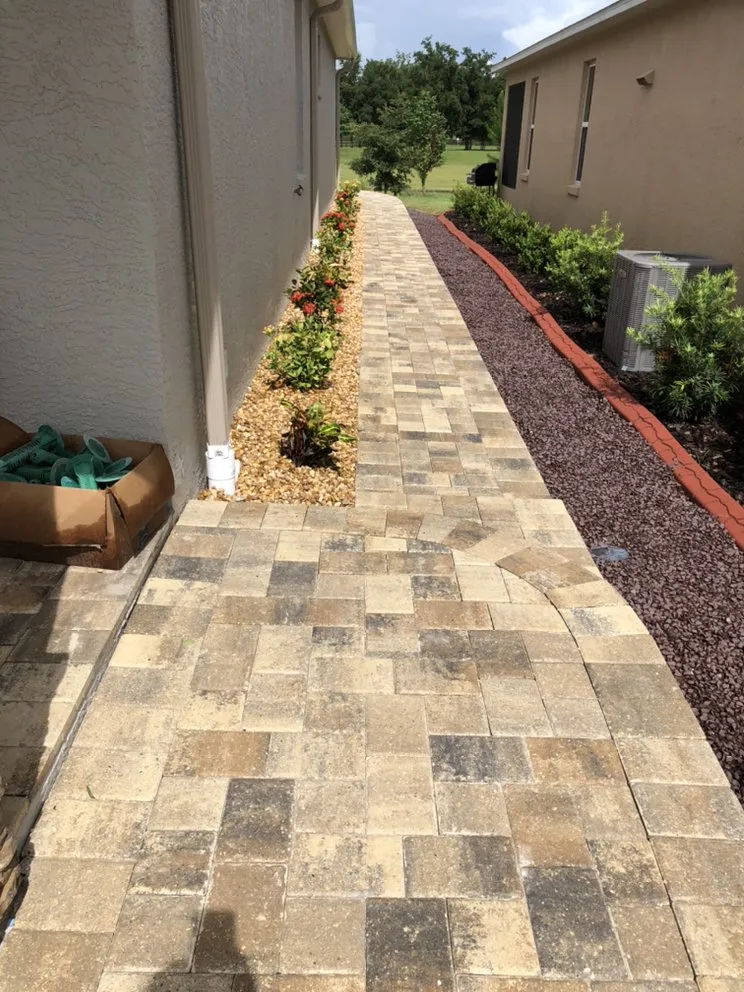 Affordable garden landscaping with custom design in Summerfield, FL by Mendez Quality Pavers & Landscaping