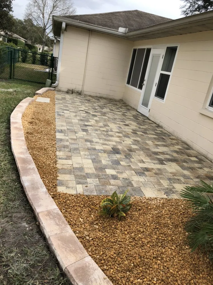 Affordable yard maintenance with custom design in Summerfield, FL by Mendez Quality Pavers & Landscaping
