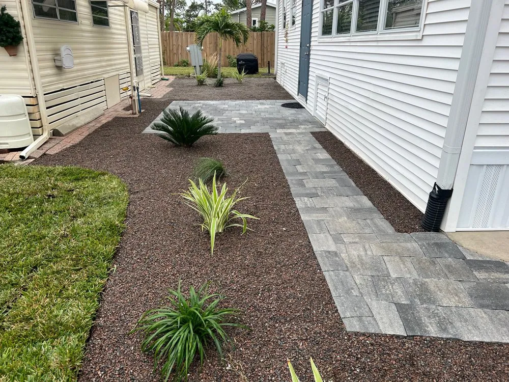 Affordable lawn mowing service for year-round maintenance in Bonita Springs, FL by Mendoza's Landscaping Design