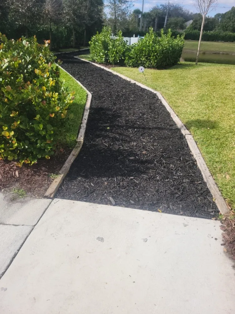 Reliable lawn care service in Homestead, FL by Menjivar Landscape Tiki Hut