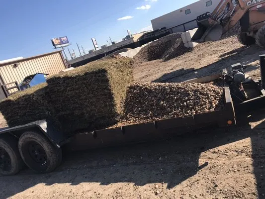 Menoz Tree Service & Landscaping Logo