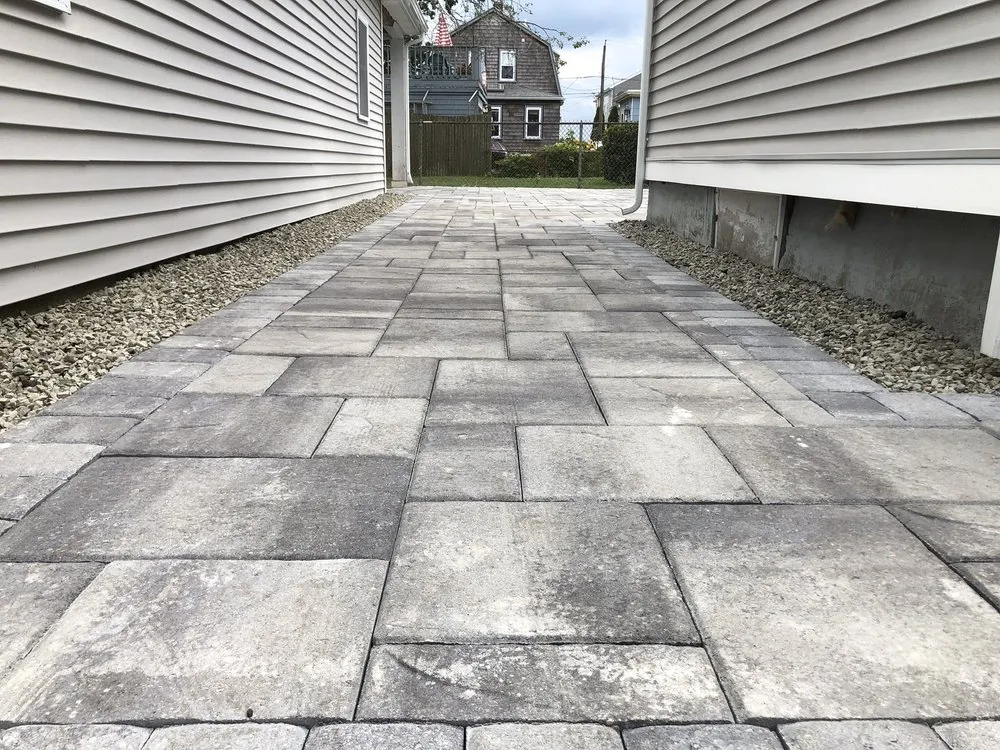 Top-rated yard cleanup service for year-round maintenance in Braintree, MA by Mento Landscaping & Paving