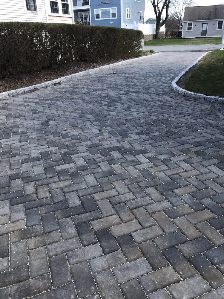 Professional landscaping services for beautiful yards in Braintree, MA by Mento Landscaping & Paving