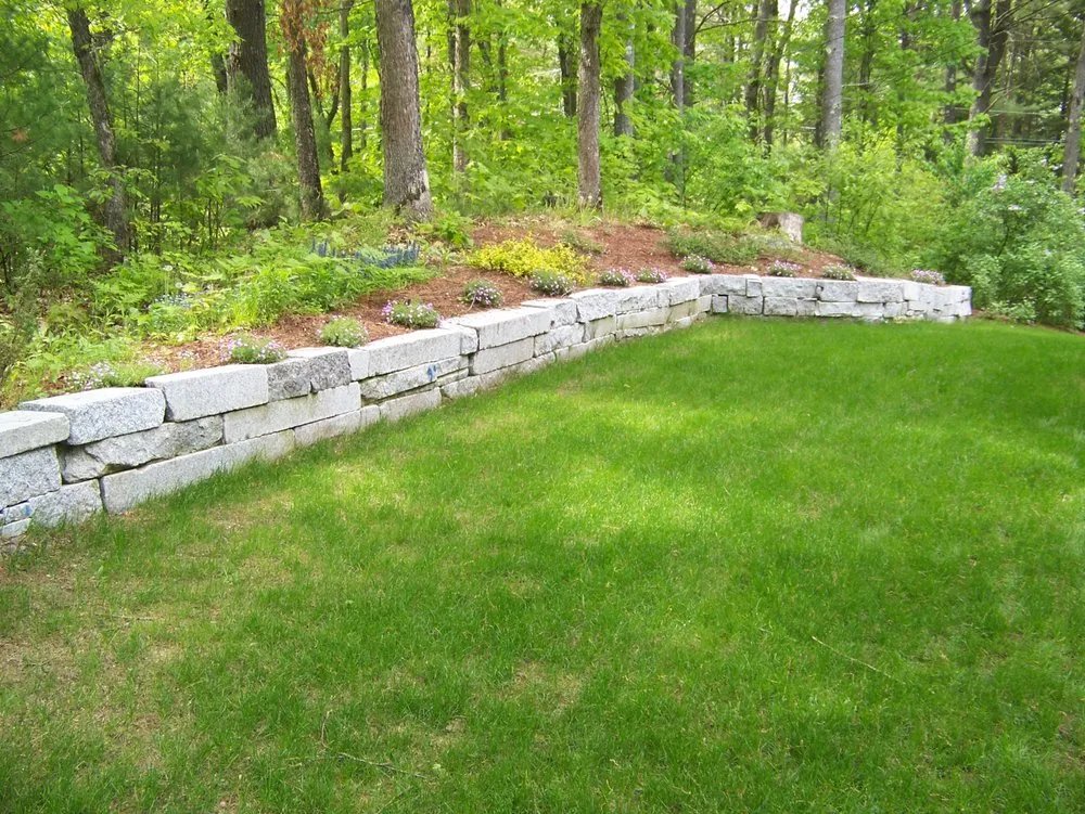 Professional yard cleanup service for beautiful yards in Merrimack, NH by Merrimack Landscape Materials