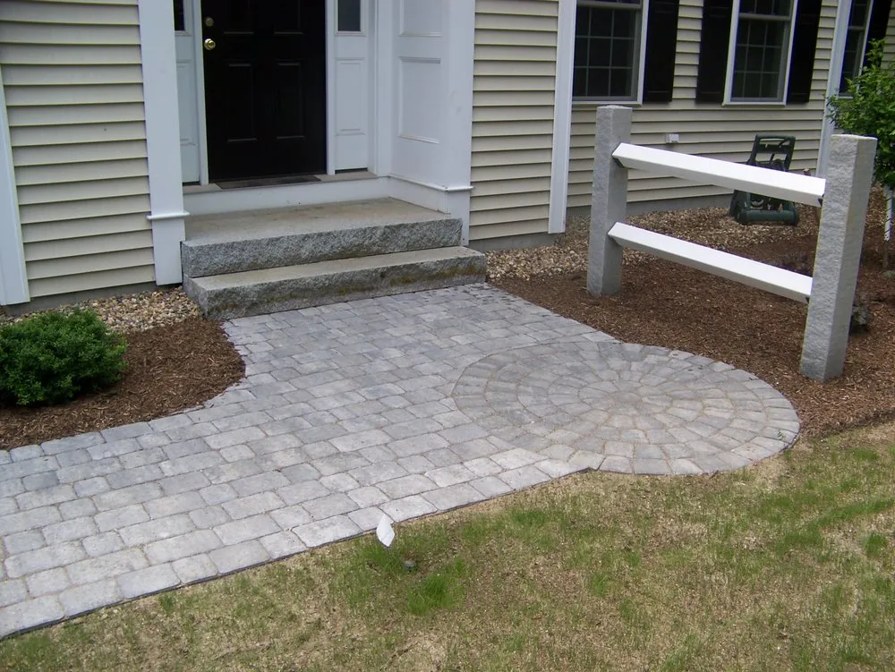 Custom lawn mowing service for year-round maintenance across Merrimack, NH - Merrimack Landscape Materials