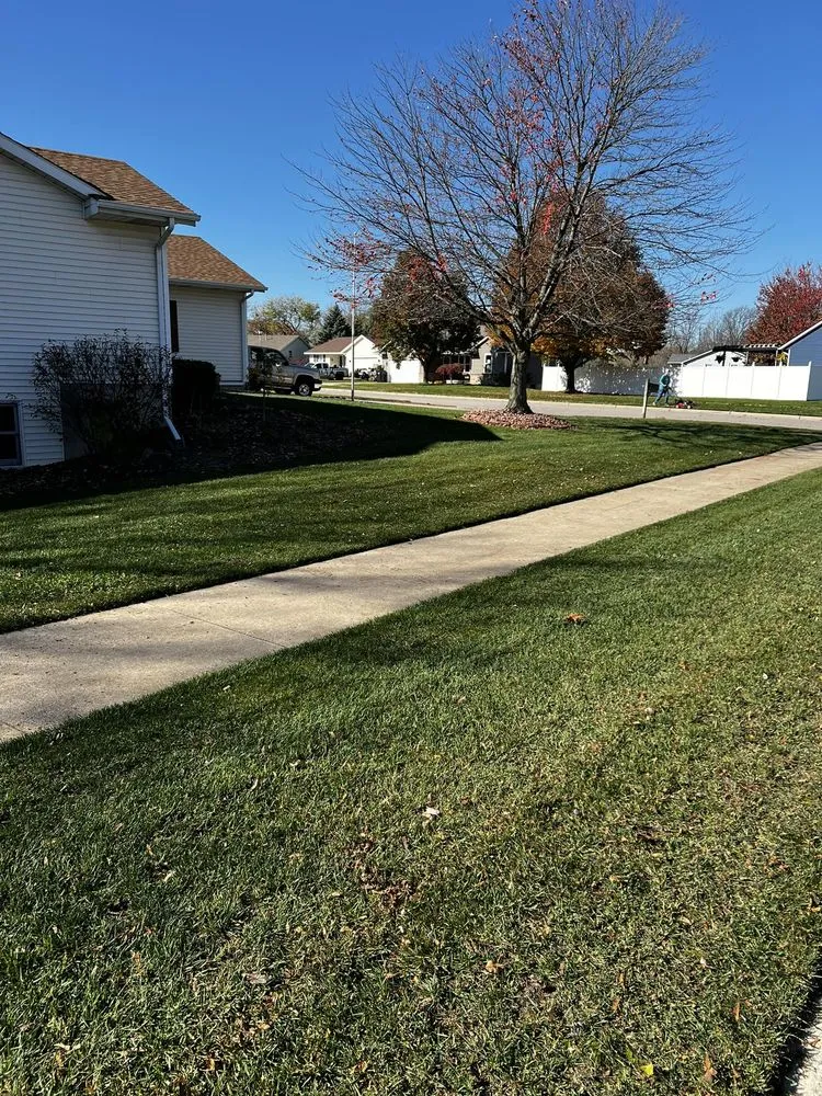 Expert lawn mowing service in Grandville, MI by Metal Blade Lawn Care