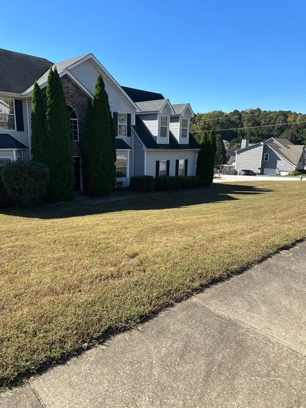 Professional lawn mowing service with custom design in Atlanta, GA by Metamorphosis Landscape & Design