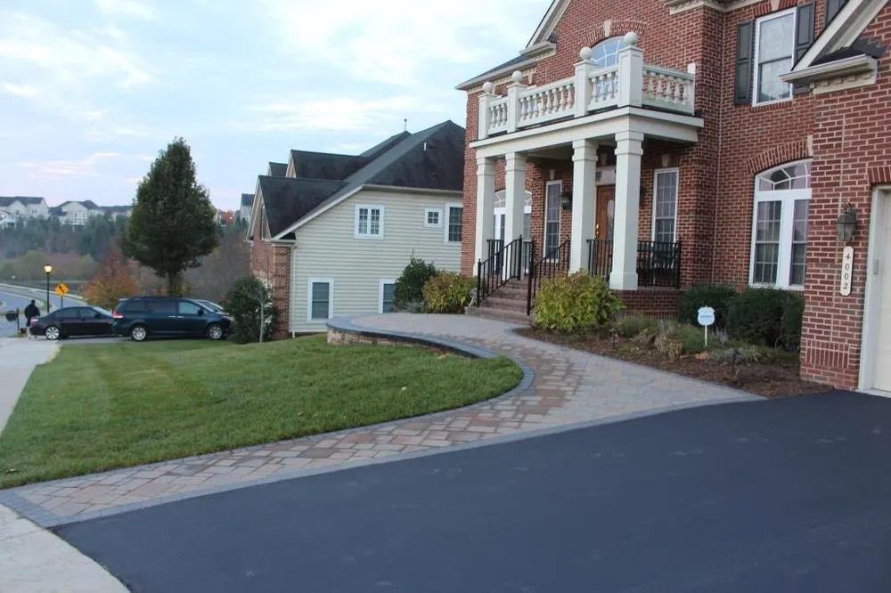 Custom yard cleanup service for year-round maintenance in Urbana, MD by Metro Landscape & Construction