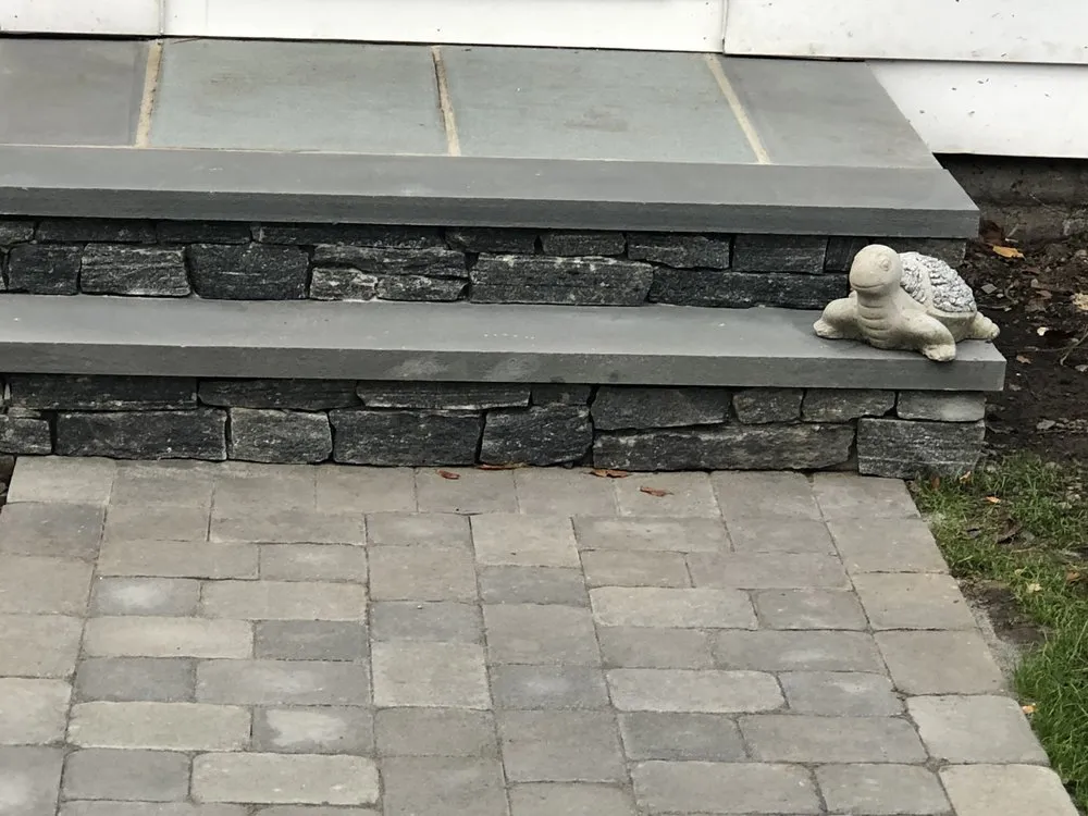 Expert lawn mowing service for homes across Framingham, MA - Metro West Landscape & Design