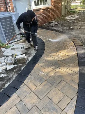 MEZ Landscaping & Construction Logo