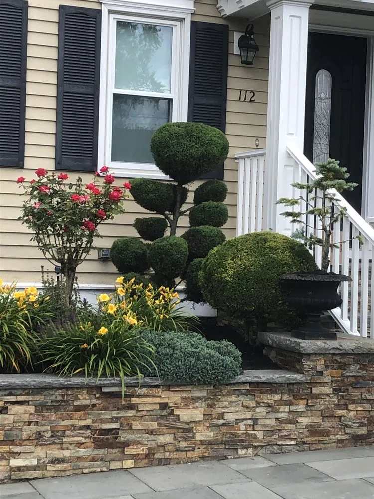 Expert lawn mowing service for residential properties in Walpole, MA by MFC Landscaping