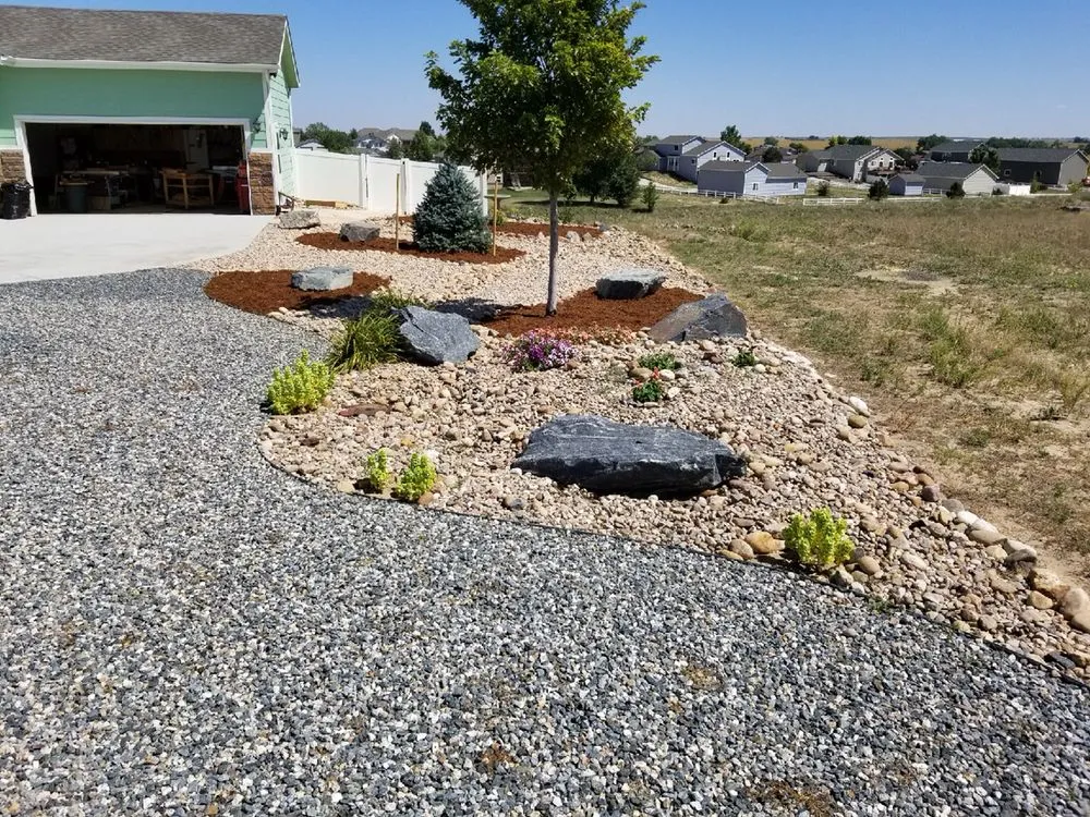 Professional yard maintenance for outdoor upgrades in Longmont, CO by Mg Landscape and Fence