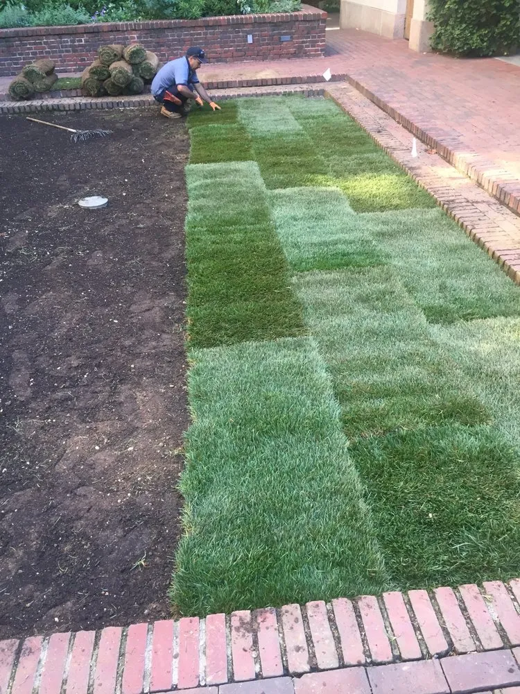 Custom landscape design for homes in Elmont, NY by MG Landscaping