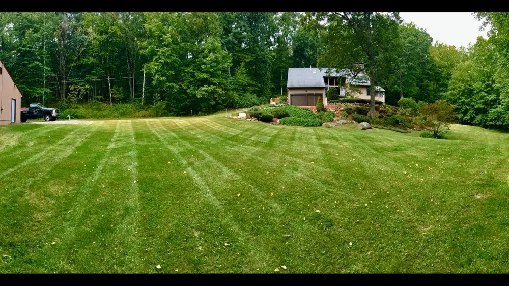 Professional lawn mowing service for year-round maintenance in Hudson, MA by MG Lawn and Landscape Services