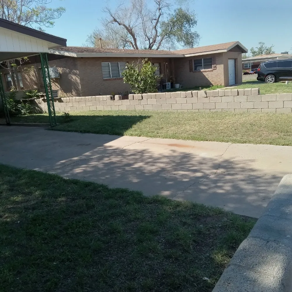 Local lawn mowing service with custom design in Odessa, TX by MG'S Lawn Care Services