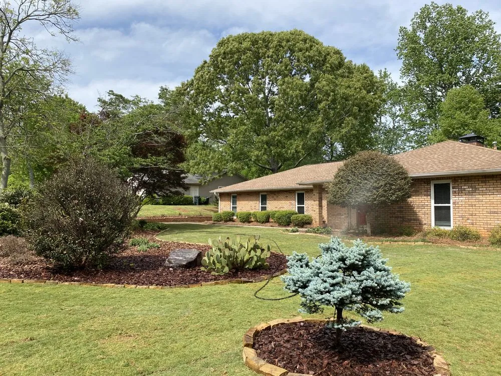 Professional lawn mowing service for homes in Canton, GA by MHH Outdoor Solutions