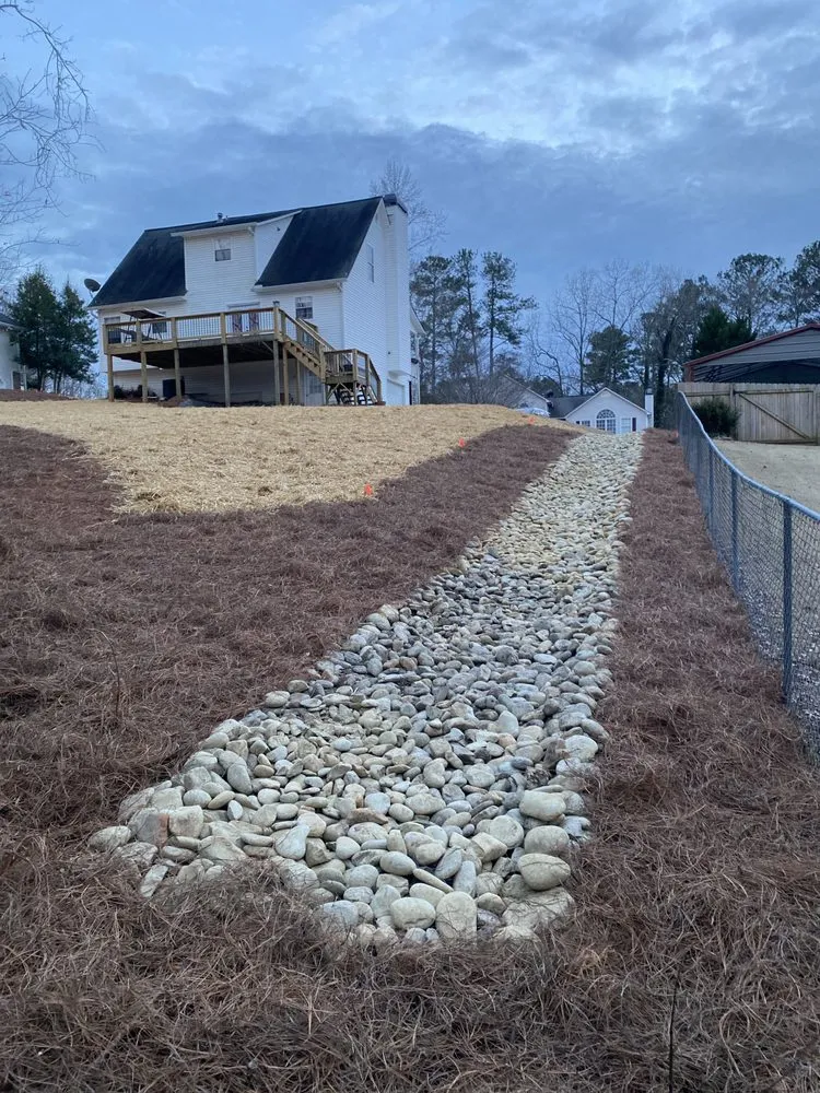 Professional lawn care service for residential properties in Canton, GA by MHH Outdoor Solutions