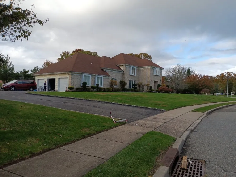 Custom yard cleanup service for year-round maintenance in Lakewood, NJ by MHL Landscaping