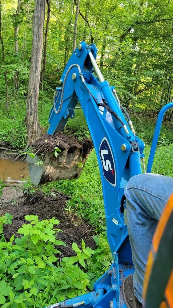 Professional residential landscaping with custom design across Midland, MI - MI Tractor Guy