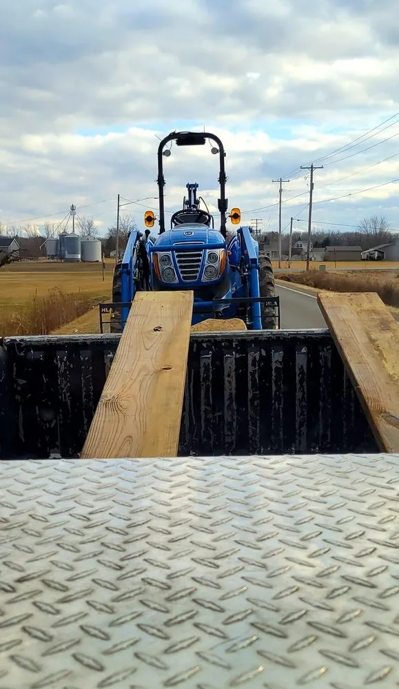 Professional lawn care service for residential properties across Midland, MI - MI Tractor Guy