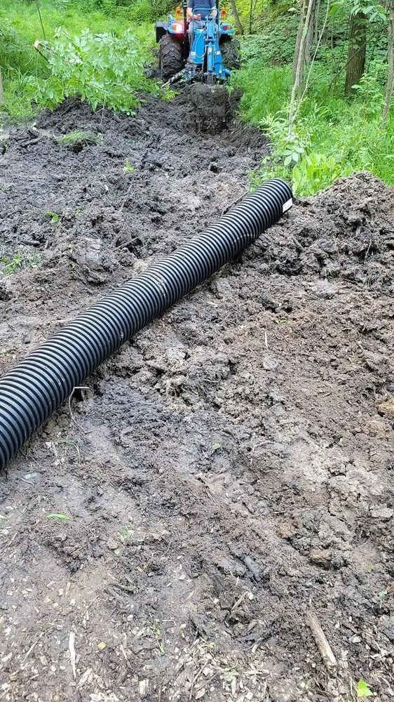 Expert yard cleanup service for year-round maintenance across Midland, MI - MI Tractor Guy