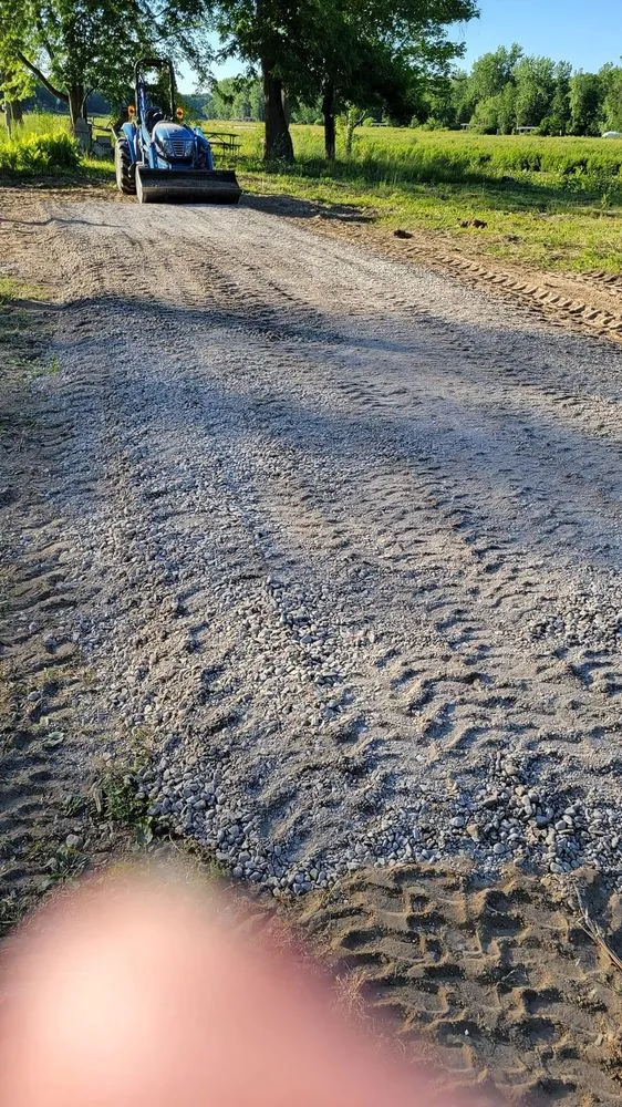 Reliable outdoor landscaping for homes across Midland, MI - MI Tractor Guy