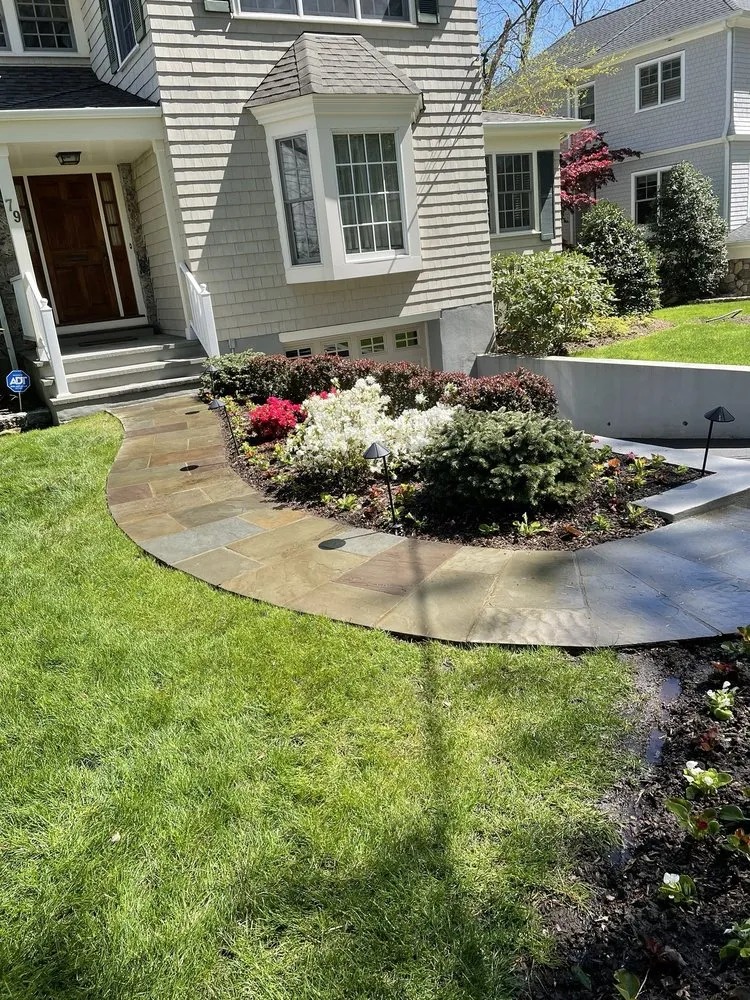 Custom lawn care service with custom design across Harrison, NY - Miano Landscaping