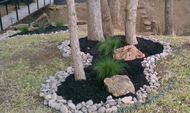 Custom garden landscaping in Mansfield, TX by Micah's Lawn Care Solutions