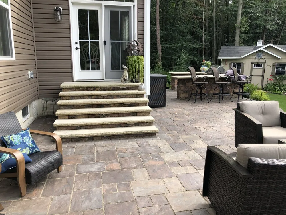 Professional landscape installation for outdoor upgrades in Avon Lake, OH by Michael & Sons