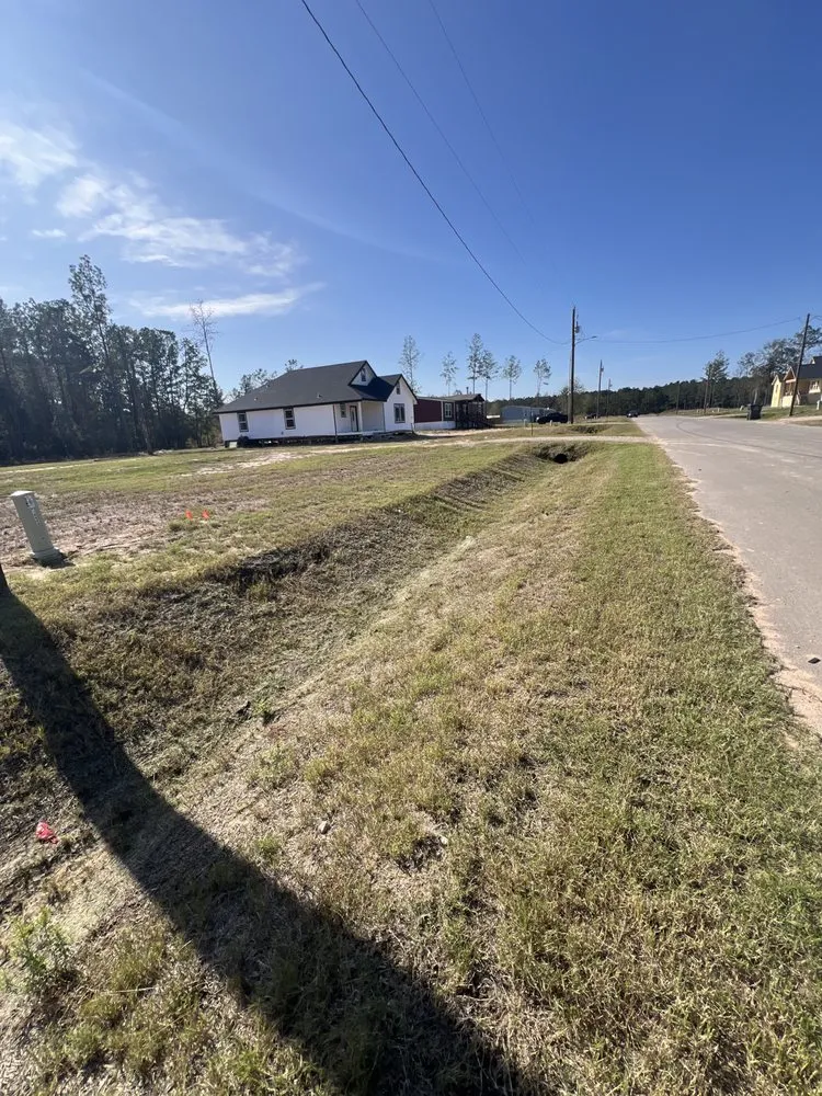 Professional yard cleanup service with custom design in Cut and Shoot, TX by Michaels Lawn Care
