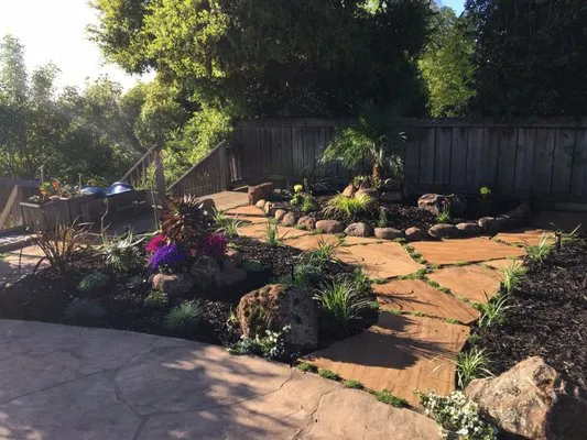 Michel Landscaping Services. Logo