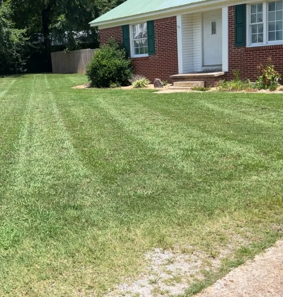 Professional lawn mowing service for homes in Charleston, IL by Mid-America Lawncare & Landscaping