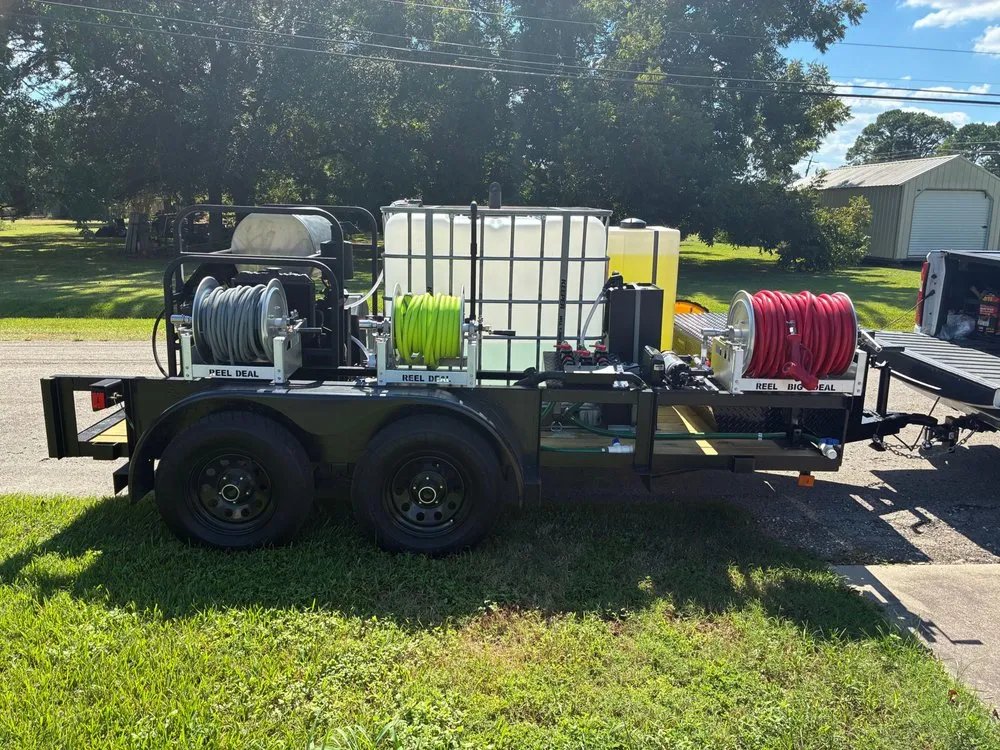 Custom landscape design in Groves, TX by Mid County Elite